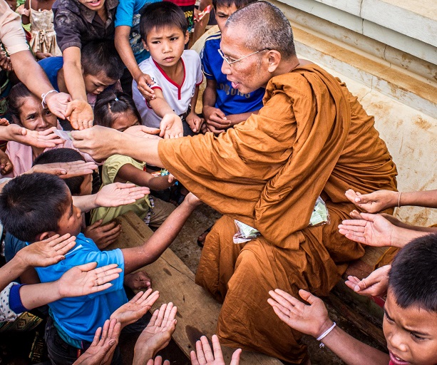 monk with children