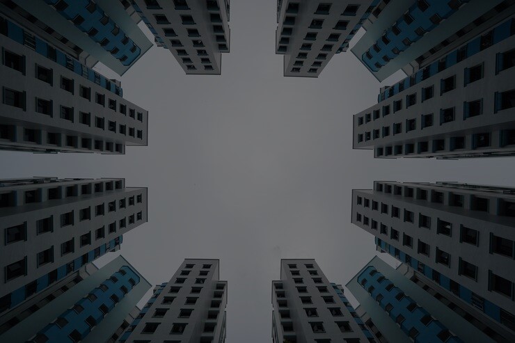 low angle view blue white modern buildings cloudy sky